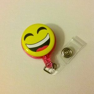 Smiley face emoji badge reel key card ID holder